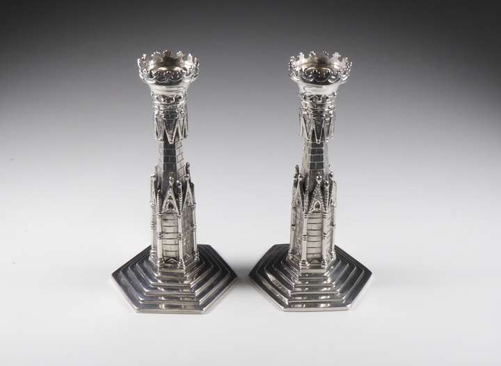 Pair of George III Irish silver candlesticks in association with Alderman Jacob West designed as Gothic architectural columns,